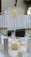 Chandelier wedding table centerpieces with lights/flowers/candles 