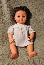 Vintage Brunette Tiny Tears Doll with an original Tiny tears dress