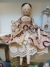Grodnertal peg Doll with her