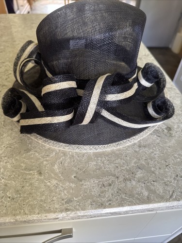 Sculptured navy blue and - and, cream