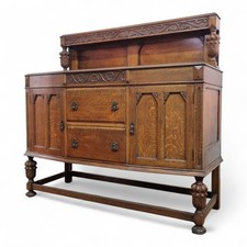 Antique bulbous carved oak bow front sideboard - buffet dresser - side cabinet