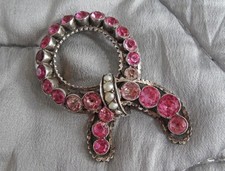 FRENCH GEORGIAN PASTE BROOCH Foil backed pink stones in silver with pearl collar