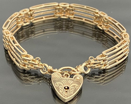Yellow gold gate bracelet - 9k,