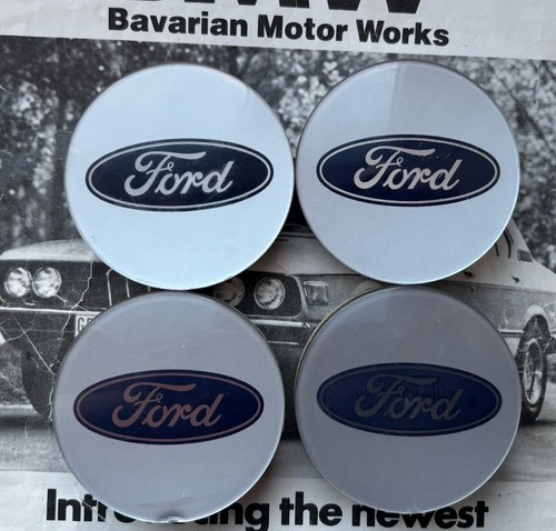 Four genuine ford centre wheel - centre,