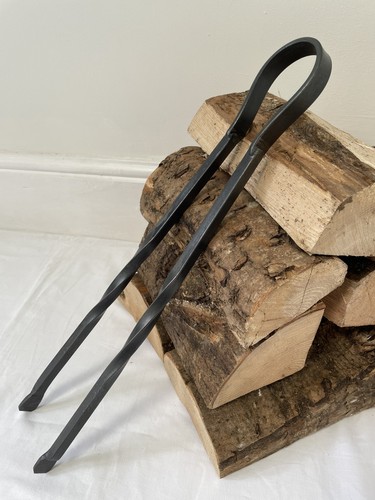 Blacksmith made fire - tongs, log