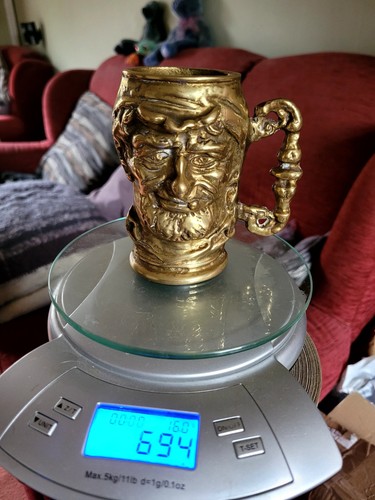 Vtg brass solid heavy toby - brass.,