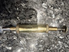 Brass Grease Gun engraved
