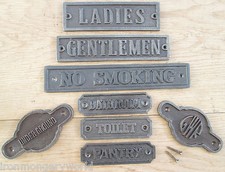 CAST IRON WALL DOOR SIGNS