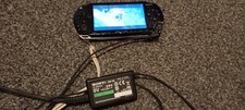 Sony PSP 1003 Console With 9 Games 10 Movies Spare Battery And Original Charger 