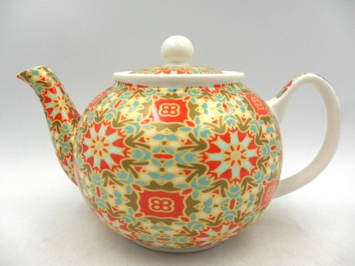 Cup teapot in golden - a,