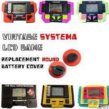 SYSTEMA LCD GAME 1980s  handheld console -  REPLACEMENT Round BATTERY COVER