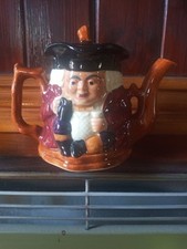 Two Faced Toby Teapot.Never