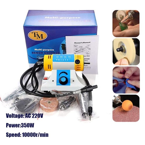 Jewellery polisher polishing - jewellery,