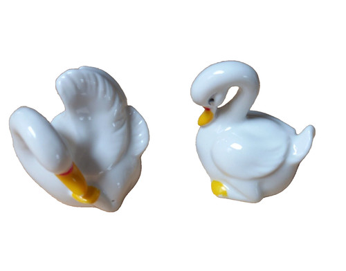 Small porcelain white birds - white,