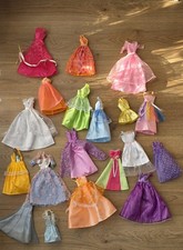 Barbie Dolls, clothes and accessories ( bike, car, horse and more) bundle