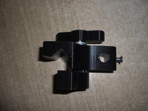 Carriage lock stop dial - +,