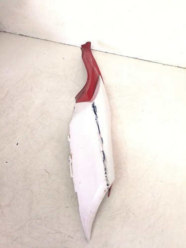 Damaged right rear fairing - rear,