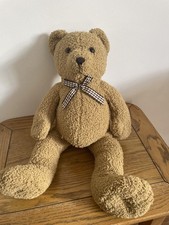 Classic teddy bear with bow-by