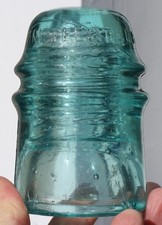 Crown Embossed Aqua CD 121 AM TEL & TEL CO Glass Insulator