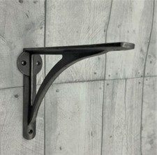 PAIR OF CAST IRONBRIDGE SHELF