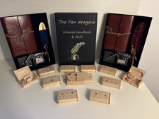 The Pen Dragons Wizards Hand Book And Feather Quill Pen Set.