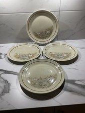 Four 10 Inch Royal Doulton