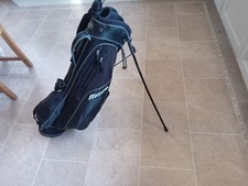 Mizuno Black Golf Bag, used with some wear, stand, hood, side pockets and straps