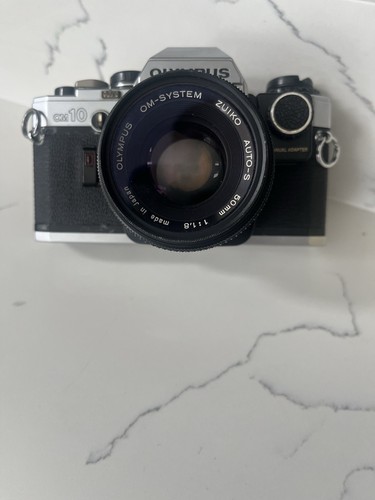 Olympus 35mm slr - om-10, film
