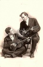 Musicians playing Gibson