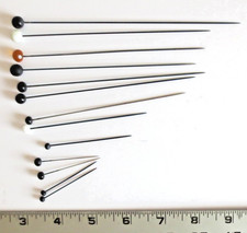 ANTIQUE VINTAGE HAT PINS THIRTEEN BLACK WHITE AND ONE AMBER 2" TO 6" LONG
