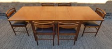 MCINTOSH EXTENDING DINING TABLE & SIX CHAIRS IN TEAK