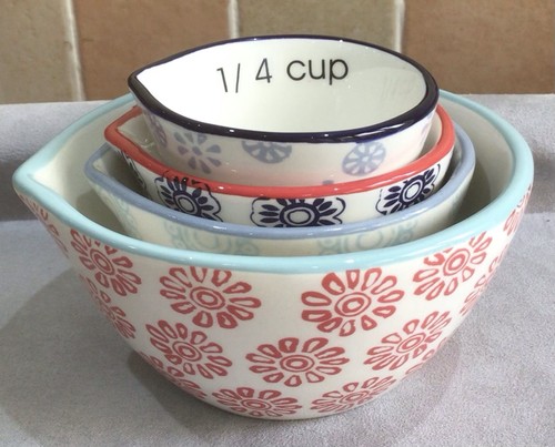 Four pretty china measuring - four,