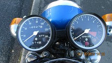 Suzuki T250 T350 T500 a pair of new Speedo and Tacho outer clock bodies 