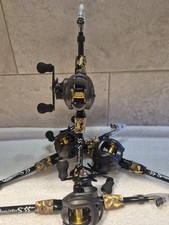 Telescopic rod and baitcaster real combo..... Left hand wind....NEW....