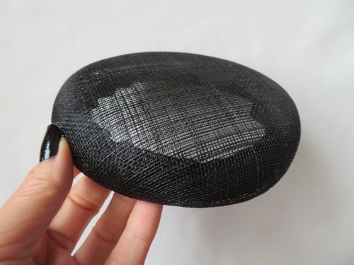 Small black round - round, pillbox