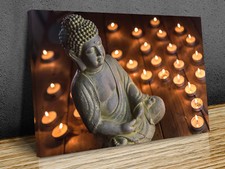 Statue of Buddha with candles mounted canvas print ready to hang