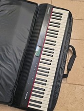 Roland Go:Piano 61 Key Digital Piano, with carry case and headphones.