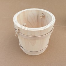 Wooden bucket with a rope as a