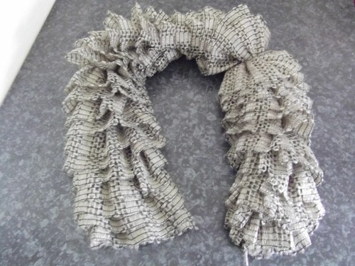 Hand knitted brown frilly - hand-knitted,