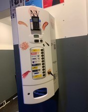 Wall mounted vending machine