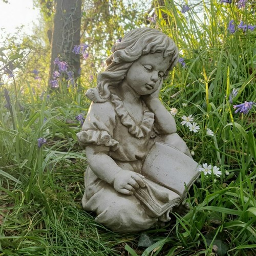 Reading girl statue - girl,