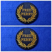 A Pair Of Black Fred Perry Mod