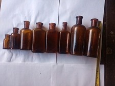 8 Brown Vintage Household Bottles