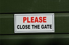 PLEASE CLOSE THE GATE sign or