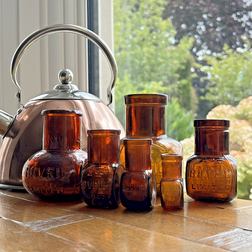 Amber bovril glass jars - 6,