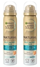 2 x Cans Garnier Ambre Solaire