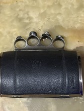 Religion Knuckle Duster Clutch