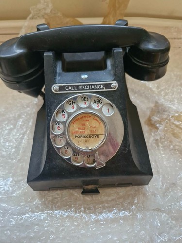 1965 black bakelite telephone - black,