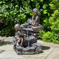 boy girl water feature for sale